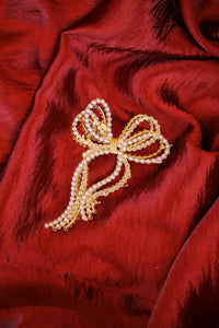 Mckenna Claw in Gold Bow