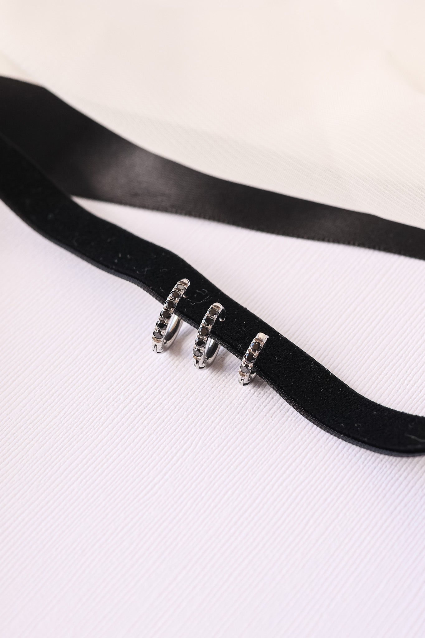 Micro Crystal Huggie Hoop in Black