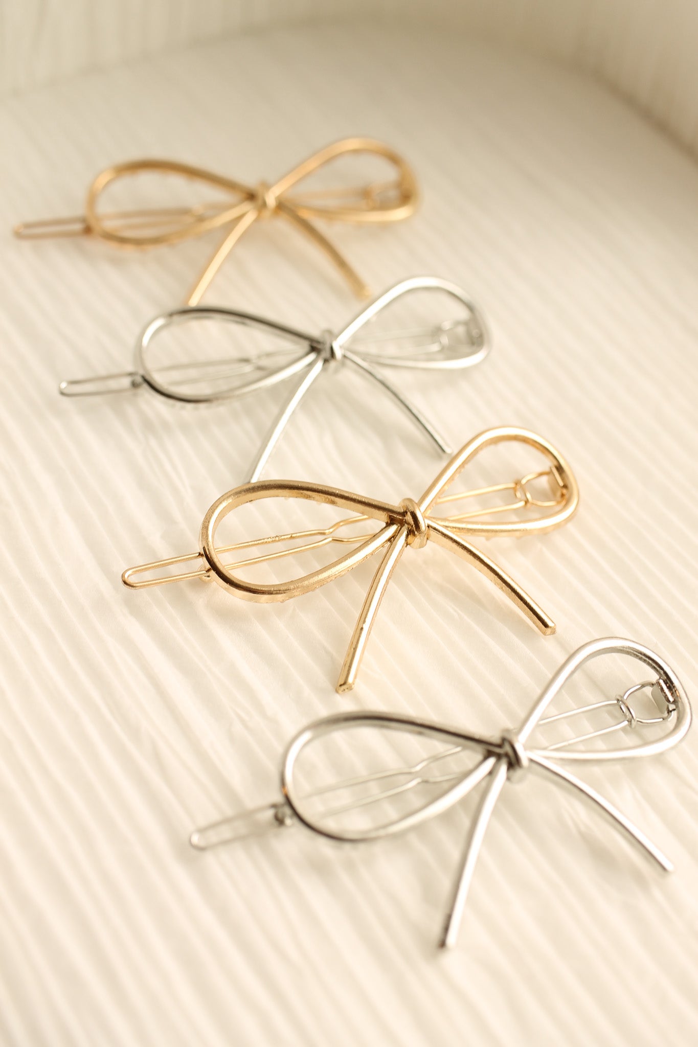 The Bow Barrette in Gold